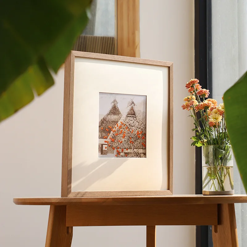 高級感のある無垢材製のフォトフレーム。壁掛け式で、高品質な写 - Bamboo Photo Frame のレビューと価格